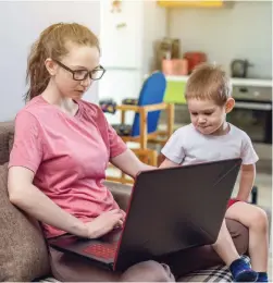  ?? DREAMSTIME ?? Some of the challenges of working from home include setting up safe, ergonomic work spaces and figuring out how home-workers manage child care while still performing their paid duties, Jim Stanford writes.