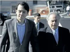  ?? SETH WENIG/THE ASSOCIATED PRESS ?? Former Turing Pharmaceut­icals CEO Martin Shkreli, left, arrives at court with his lawyer Benjamin Brafman, in New York on Monday. Shkreli is on trial for securities fraud.