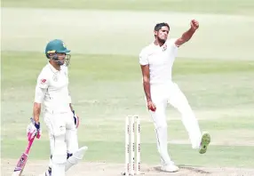  ?? — AFP photo ?? Sri Lanka's Kasun Rajitha(R) bowls during the third day of the first Cricket Test between South Africa and Sri Lanka at the Kingsmead Stadium in Durban.