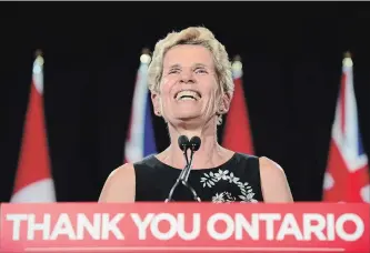  ?? FRANK GUNN THE CANADIAN PRESS ?? At a press conference on Friday, outgoing Ontario Premier Kathleen Wynne says she hopes premier-designate Doug Ford changes the rules to grant the Liberals official party status.