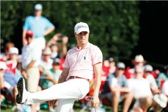  ??  ?? American Justin Thomas reacts after missing an eagle putt at 18 in the first round of the US PGA Tour Championsh­ip. - AFP photo