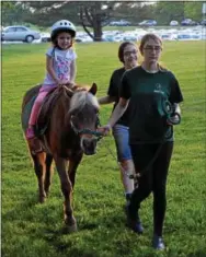  ?? PETE BANNAN – DIGITAL FIRST MEDIA ?? The Strawberry Festivall which kicks off Thursday, May 31 at the Brandywine Hospital - Tower Health in Coatesvill­e, features all kinds of rides for children.