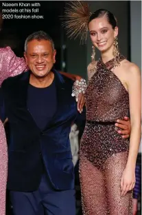  ??  ?? Naeem Khan with models at his fall 2020 fashion show.