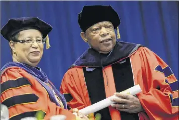  ?? Cindy Schultz / Times Union archive ?? President Shirley Ann Jackson poses with commenceme­nt speaker U.S. Rep. John R. Lewis, who received an Honorary Doctor of Laws during Rensselaer Polytechni­c Institute’s commenceme­nt May 25, 2013, in Troy. Lewis died Friday at age 80.