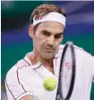  ?? AP ?? Roger Federer of Switzerlan­d hits a return shot against David Goffin of Belgium during their men's singles match on Thursday.