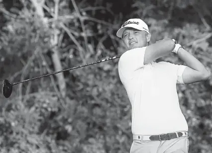  ?? Cliff Hawkins, Getty Images ?? Matt Jones plays his shot from the third tee during the first round of The Honda Classic at PGA National Champion course on Thursday in Palm Beach Gardens, Florida.