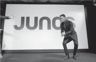  ??  ?? Michael Bublé sticks out his tongue after being introduced as the host of the 2018 Juno Awards, which will be held in Vancouver.