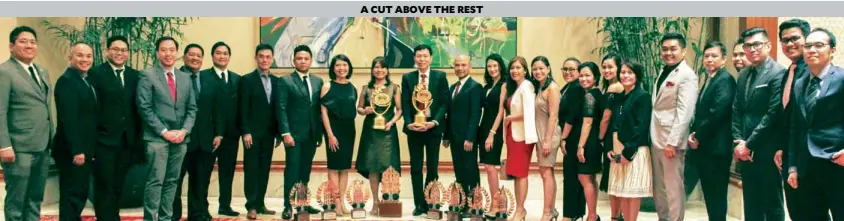  ??  ?? Team Megaworld led by chief operating officer Lourdes Gutierrez-Alfonso (10th from left) and senior vice president and treasurer Dr. Francis C. Canuto (11th from left) received a total of 10 awards for the company during the Property and Real Estate Awards 2018.