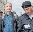  ??  ?? Mr Tatchell is led away by police