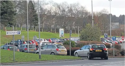  ??  ?? Cars queue to enter car park nine at Ninewells Hospital, Dundee.