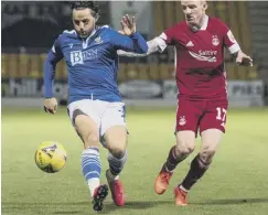  ??  ?? 0 St Johnstone’s Craig Conway battles with Jonny Hayes.