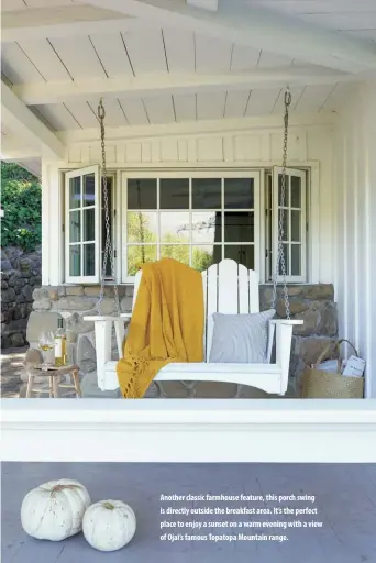  ??  ?? Another classic farmhouse feature, this porch swing is directly outside the breakfast area. It’s the perfect place to enjoy a sunset on a warm evening with a view of Ojai’s famous Topatopa Mountain range.