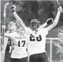  ?? JOSHUA MCKERROW/BALTIMORE SUN MEDIA ?? Severna Park’s Emma Marsh, right, celebrates with Lila Slattery after scoring on St. Mary’s in field hockey.