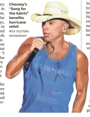  ?? RICK SCUTERI/ INVISION/AP ?? Chesney’s “Song for the Saints” benefits hurricane relief.