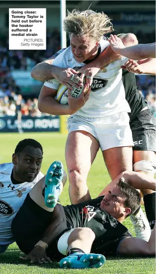  ?? PICTURES: Getty Images ?? Going close: Tommy Taylor is held out before the hooker suffered a medial strain