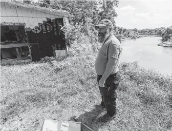  ?? William Luther / Staff photograph­er ?? Matthew Macon lives across the Colorado River from a quarry that has been cited for spilling sediment-laden water into the river repeatedly. He says the spills altered the river’s course.