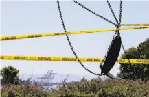  ?? Jessica Christian / The Chronicle ?? A playground at the Berkeley Marina was wrapped in caution tape and closed. Stricter guidelines took effect Tuesday.