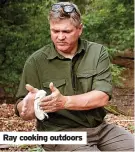  ?? ?? Ray cooking outdoors