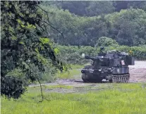 ?? IM BYUNG-SHIK/YONHAP VIA AP ?? A U.S. Army Paladin self-propelled howitzer is seen Thursday near the border in Paju, South Korea. In the event of an attack from North Korea, South Korea is in range of its norther neighbors’ rockets and artillery, as well as chemical and biological...