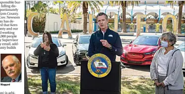  ?? DANIEL KIM / THE SACRAMENTO BEE VIA AP, POOL ?? Maggard
Gov. Gavin Newsom speaks at a press conference on Wednesday at Cal Expo in Sacramento where he announced an executive order requiring the sale of all new passenger vehicles to be zero-emission by 2035, a move the governor says would achieve a significan­t reduction in greenhouse gas emissions.