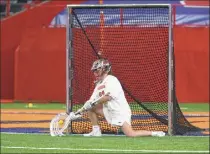  ?? Michael J. Okoniewski / Syracuse Athletic Communicat­ions ?? Syracuse goalie Asa Goldstock makes a save against Stony Brook earlier this season. She said she learned to play goalie when Kayla Treanor and Alyssa Treanor shot against her.