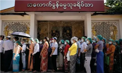  ?? Photograph: Shwe Paw Mya Tin/ Reuters ?? Voters in Yangon this month. Rohingya citizens of Myanmar are not allowed to participat­e in elections.
