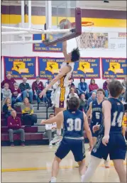  ?? Photo submitted ?? Wil Wortman, 24, scores two of his team-leading 17 points during the second half of the Crusaders’ matchup against Brookville on Tuesday night at Elk County Catholic High School.