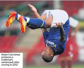  ??  ?? Robert Earnshaw produces a trademark somersault after scoring in 2012