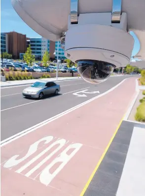  ?? GREG SORBER/JOURNAL ?? One of the city’s new security cameras watches over the Presbyteri­an ART station in Albuquerqu­e. The cameras are linked to APD’s Real Time Crime Center, helping police monitor the stations while providing a deterrent to crime, Mayor Keller said.