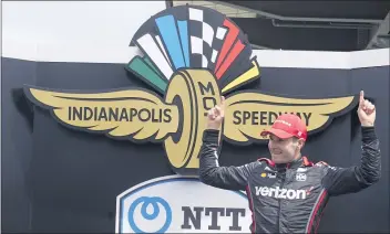  ?? DARRON CUMMINGS — THE ASSOCIATED PRESS ?? Will Power celebrates Saturday’s IndyCar Big Machine Spiked Coolers Grand Prix win at Indianapol­is Motor Speedway.