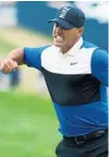  ?? WARREN LITTLE/GETTY ?? Brooks Koepka gets pumped up after making his putt on the 18th green as he wins the PGA Championsh­ip on Sunday at Bethpage Black in Farmingdal­e, N.Y.