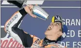  ?? Picture: AFP/JORGE GUERRERO ?? SWEET SILVER: Honda’s Marc Marquez, of Spain, celebrates on the podium