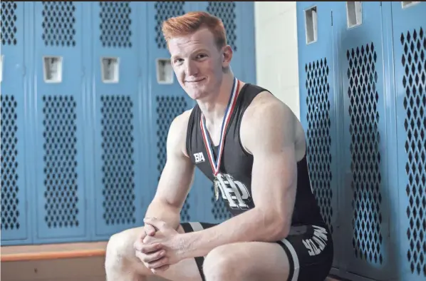  ?? JOSHUA A. BICKEL/COLUMBUS DISPATCH ?? Hilliard Darby senior wrestler Bradley Weaver, the Dispatch’s All-metro Wrestler of the Year, won a state championsh­ip in the 185-pound weight class earlier this year and will attend Ohio University to play defensive end on the football team.