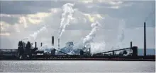  ?? BARRY GRAY THE HAMILTON SPECTATOR ?? ArcelorMit­tal Dofasco on a cloudy day on the bayfront in February of last year.