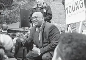  ?? BARBARA HADDOCK TAYLOR/BALTIMORE SUN ?? Baltimore Mayor Bernard C. “Jack” Young waves to supporters as he kicks off his campaign for mayor at a rally Saturday on North Avenue. The Democratic primary is April 28.