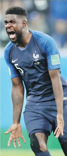  ?? PRESS PETR DAVID JOSEK/THE ASSOCIATED ?? France’s Samuel Umtiti celebrates his team’s 1-0 victory over Belgium during their World Cup semifinal Tuesday in St. Petersburg, Russia. Umtiti scored the match’s decisive goal.