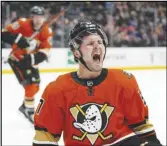  ?? Associated Press ?? The Ducks’ Mason McTavish celebrates his goal against the New York Rangers during the first period on Wednesday in Anaheim. The Ducks won 3-2 for their first victory in regulation.