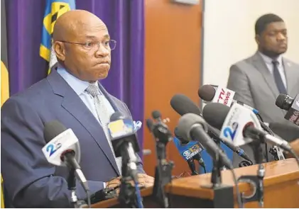  ?? JERRY JACKSON/BALTIMORE SUN PHOTOS ?? Interim Police Commission­er Gary Tuggle speaks to the news media after an officer seen on video punching a man had resigned.