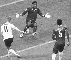  ??  ?? Germany’s forward Timo Werner (left) scores his team’s third goal during the FIFA Confederat­ions Cup group B football match against Cameroon at the Fisht Stadium Stadium in Sochi in this June 25 file photo. — AFP photo