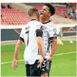  ?? FOTO: DPA ?? Karim Adeyemi (r.) jubelt mit Florian Wirtz nach seinem Treffer.