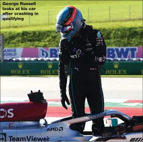  ?? ?? George Russell looks at his car after crashing in qualifying