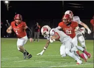  ?? Daniel Bell ?? Sonoravill­e’s JoJo McDaniels spins away from a tackle on Friday night during a game with Lakeview-Fort Oglethorpe.