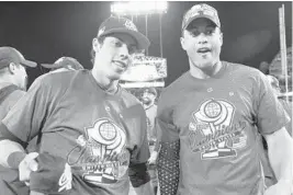  ?? JAYNE KAMIN-ONCEA/GETTY IMAGES ?? Marlins Christian Yelich, left, and Giancarlo Stanton had key hits in Wednesday night’s 8-0 victory by Team USA in the finals of the World Baseball Classic over Puerto Rico.