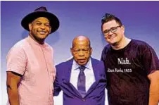  ?? ?? Richard Allen (left) and Taran Gray (right) in 2017 with civil rights icon John Lewis at an early reading of their musical “Freedom Riders.”
