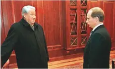  ?? AP ?? In this file photo taken on December 31, 1999, former President Boris Yeltsin smiles as he talks to the then Russian acting President and Premier Vladimir Putin, in the Kremlin.