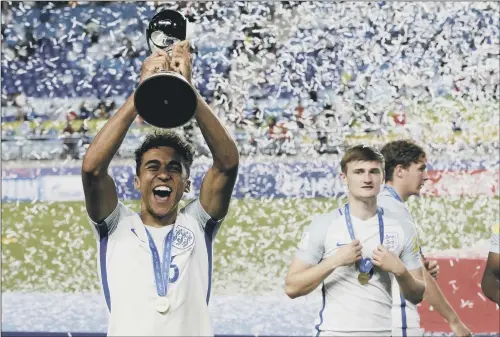 ?? PICTURE: AHN YOUNG-JOON/AP ?? WORLD’S BEST: Sheffield-born Dominic Calvert-Lewin holds aloft the Under-20s World Cup after England’s win in the final over Venezuela.