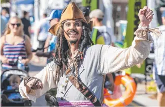  ??  ?? A Captain Jack Sparrow impersonat­or entertains crowds at the boat show. Pictures: Jerad Williams