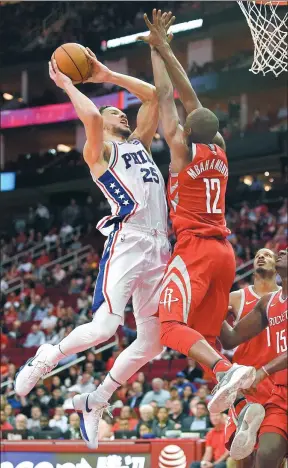  ?? ERIC CHRISTIAN SMITH / AP ?? Philadelph­ia 76ers’ Ben Simmons goes up for a bucket against Houston Rockets’ Luc Mbah a Moute during the second half of Monday’s NBA clash in Houston. Simmons scored a career-high 24 points to lead Philadelph­ia to a 115-107 victory.