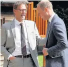  ??  ?? > Prince William speaks with founder of Sporting Chances, Tony Adams