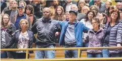  ?? Picture: AP ?? TOGETHER: Participan­ts link arms at the interfaith memorial service to the 11 people killed at a Pittsburgh synagogue.